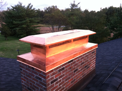 Before and after chimney cap replacement in Bridgehampton, NY