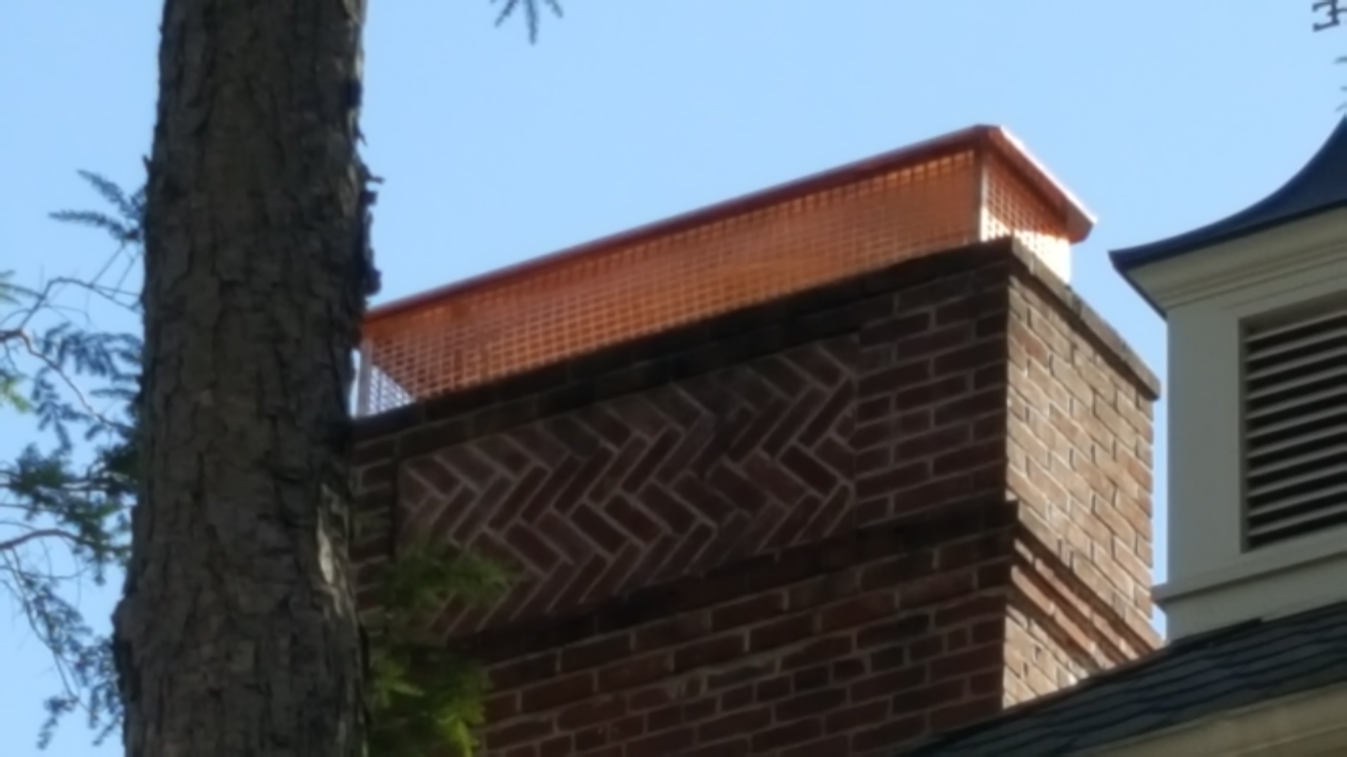 New stainless steel chimney cap installed in Bridgehampton, NY