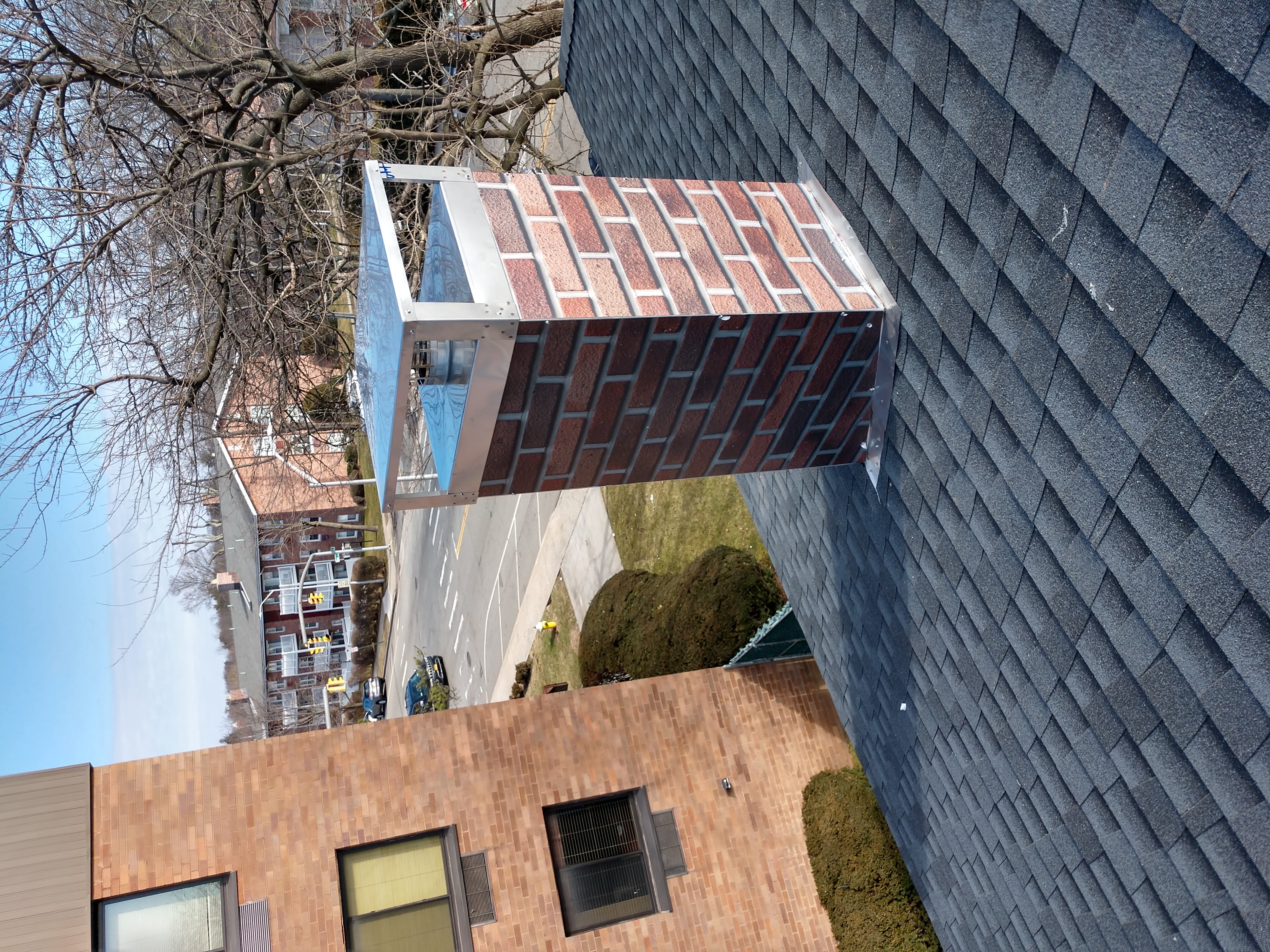New elastomeric sealant applied to chimney crown in Bridgehampton, NY