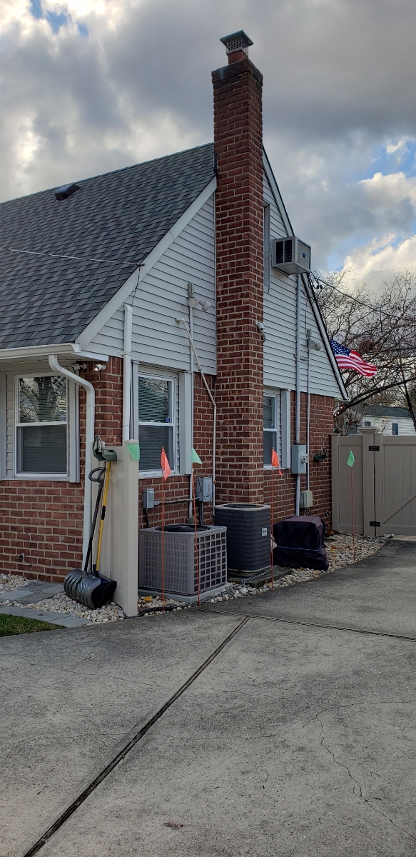 Professional chimney repointing restoring brick joints in Bridgehampton, NY