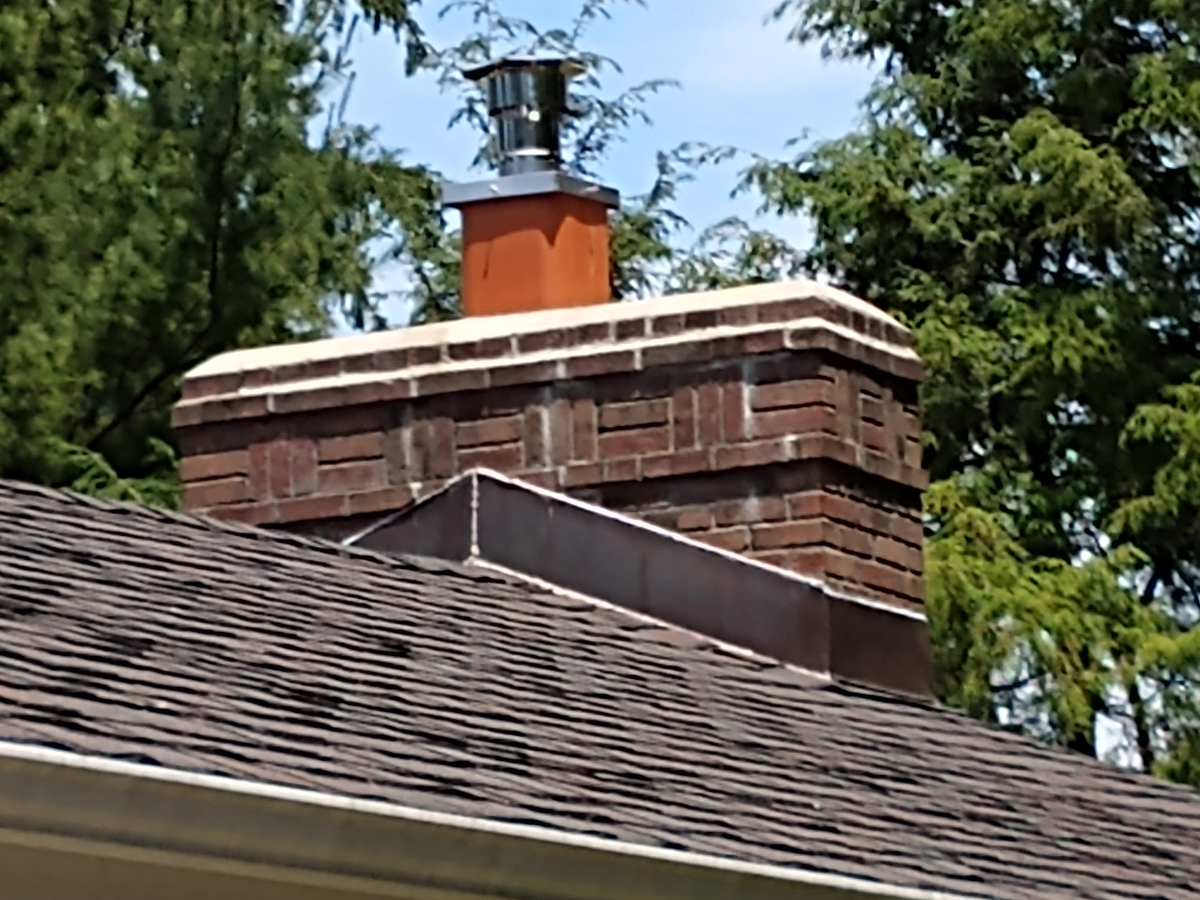 Stainless steel chimney cap with animal guard in Bridgehampton, New York